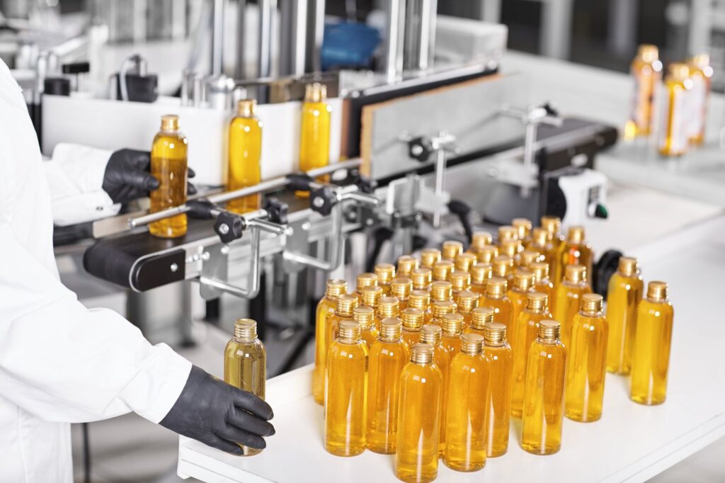 Skincare bottles on production line at WeBrandU Cosmetic Concept Design's Los Angeles facility